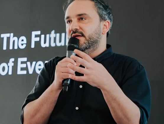 Photo of Ben Constantini speaking