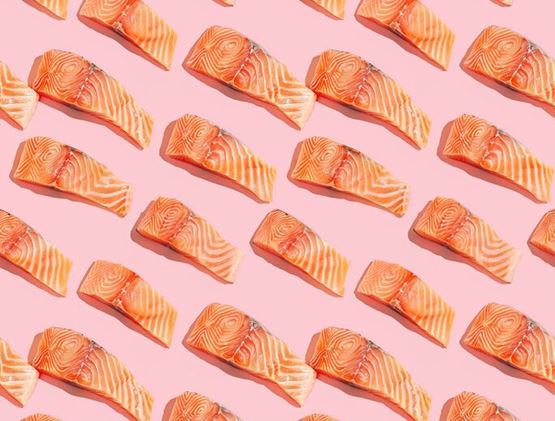 Salmon on pink background