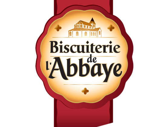Biscuiterie de l’Abbaye logo on a red ribbon.