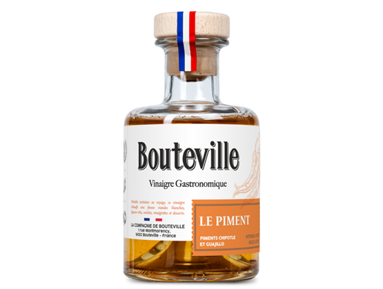 Bottle of Bouteville gastronomic chilli vinegar made with chipotle and guajillo peppers, presented against a white background.