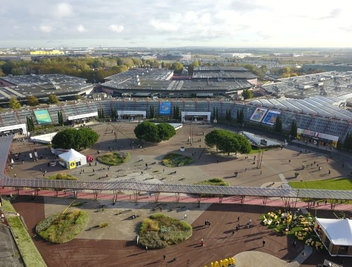 Aerial view of Paris Nord Villepinte Exhibition Centre during SIAL, showing the halls, walkways, and landscaped areas.