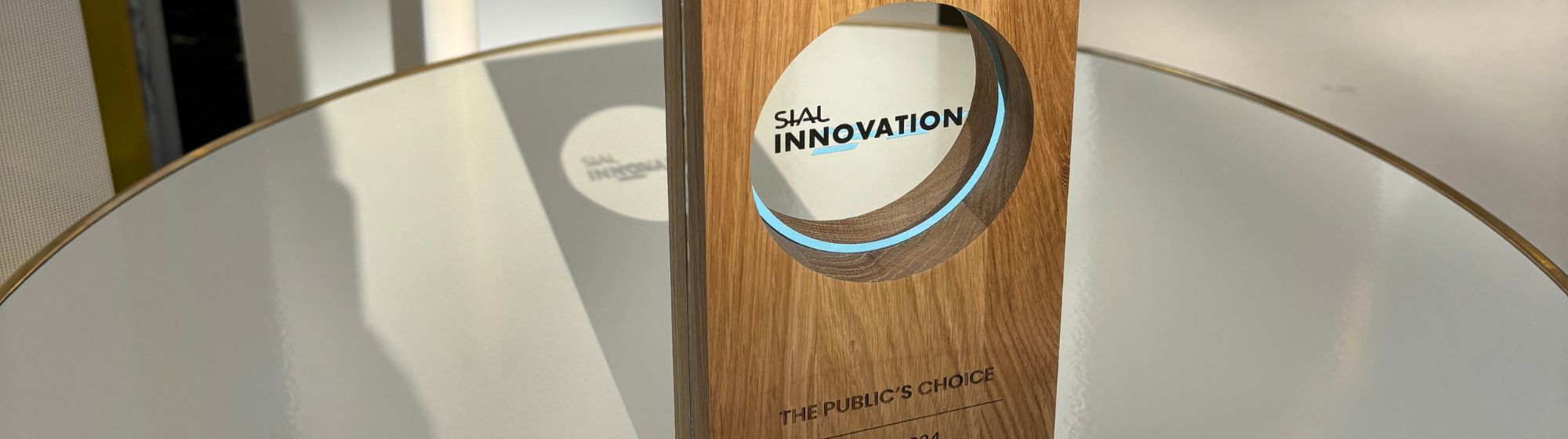 SIAL Innovation Public's Choice Award 2024 trophy, recognizing the most popular products at the show.
