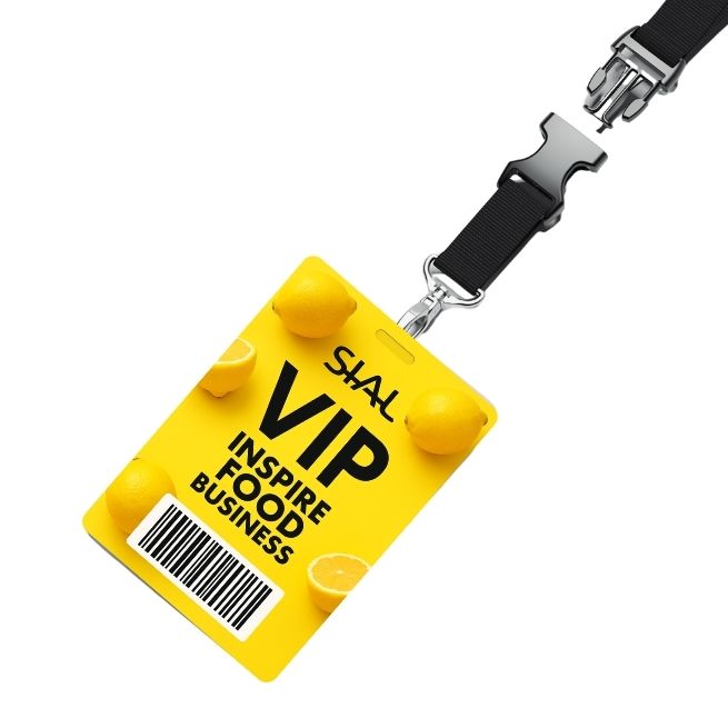 Badge VIP pour SIAL Paris 2026 avec le logo 'Inspire Food Business' et des citrons jaunes