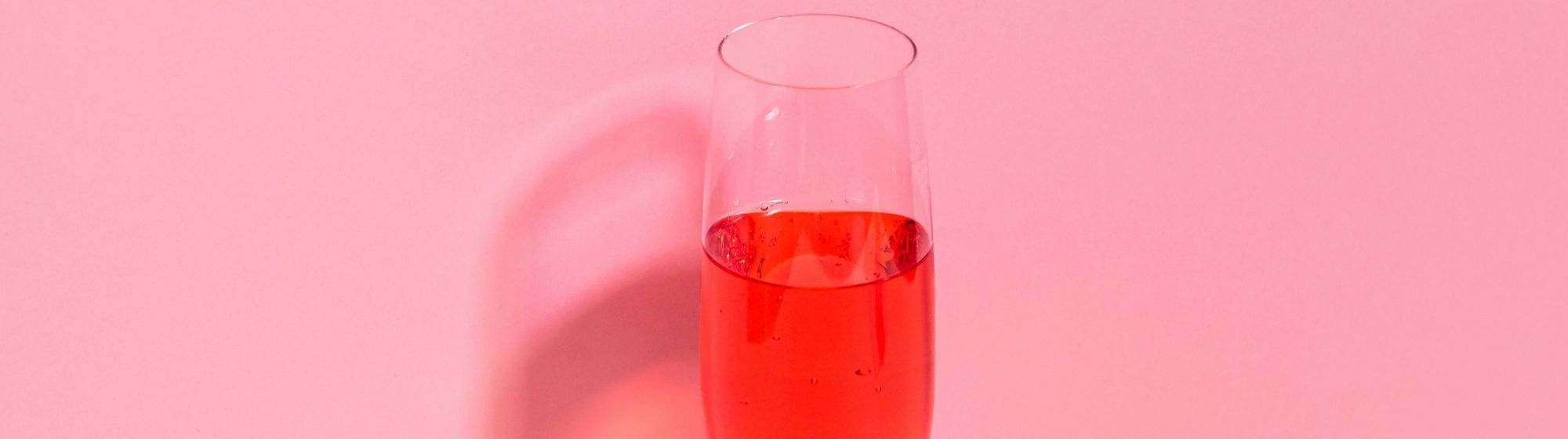Red water in champagne glass