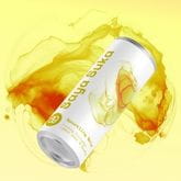 Saya Suka soft drink can with dynamic yellow splashes.