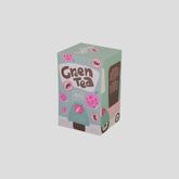 Pastel-colored green tea box displayed on a light grey background.