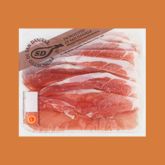Slices of cured ham packaged in a transparent bag