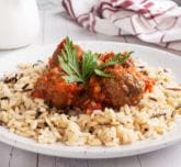 Rice with meatballs in tomato sauce