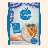 Grilled chicken fillet served on a plate, Mon Baluchon brand packaging.