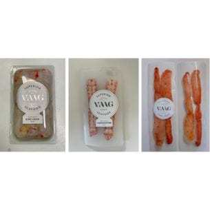 Transparent packaging containing ready-to-eat pieces of king crab meat.