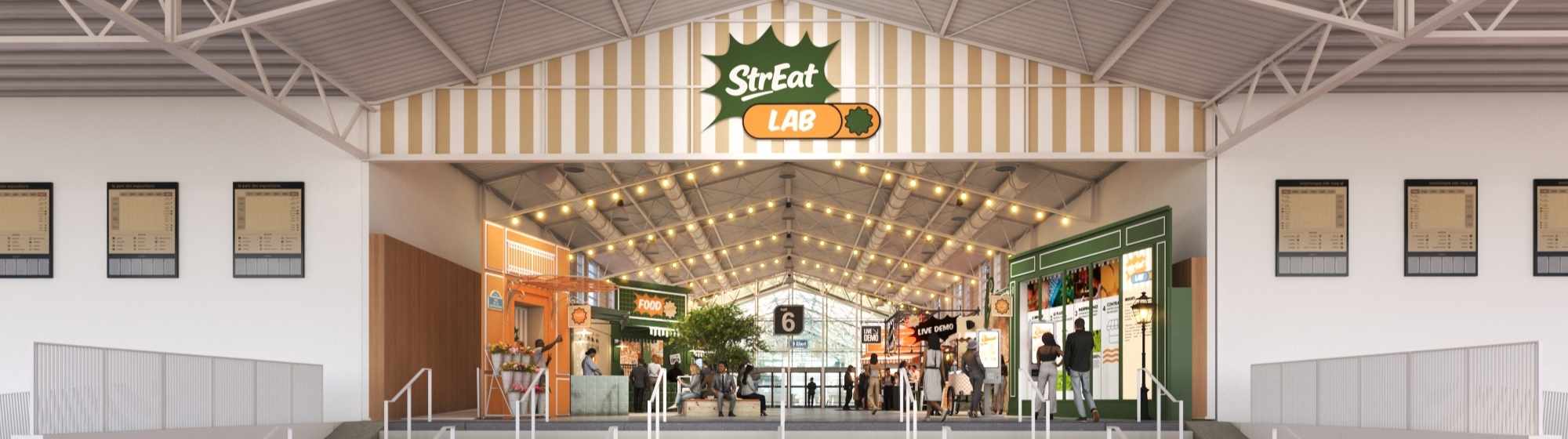Vue panoramique de l’entrée StrEat Lab, avec stands food colorés, guirlandes lumineuses et visiteurs dans une halle.
