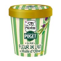 Tub of fleur de lait ice cream with olive oil, green packaging on a white background.