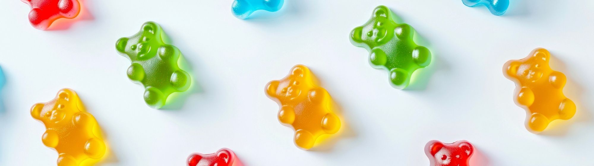Colorful gummy bears in creative composition