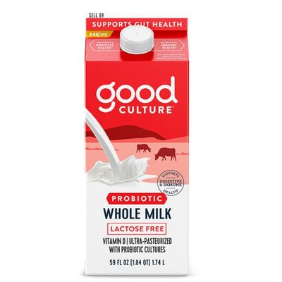 Bouteille de lait entier probiotique avec emballage rouge, présentée sur fond blanc.