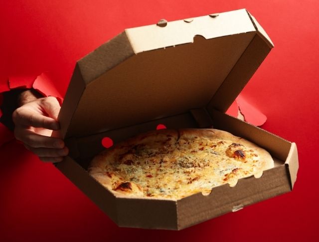 Pizza in a cardboard box
