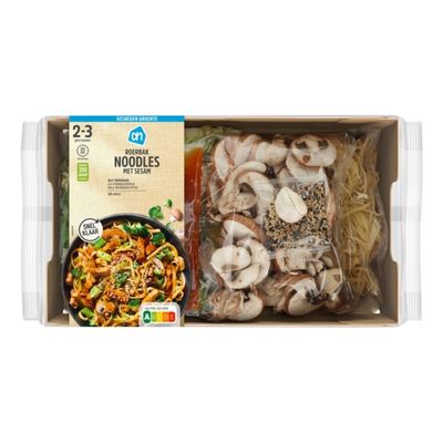 Stir fry noodle kit with sesame, mushrooms and sauce in tray packaging.